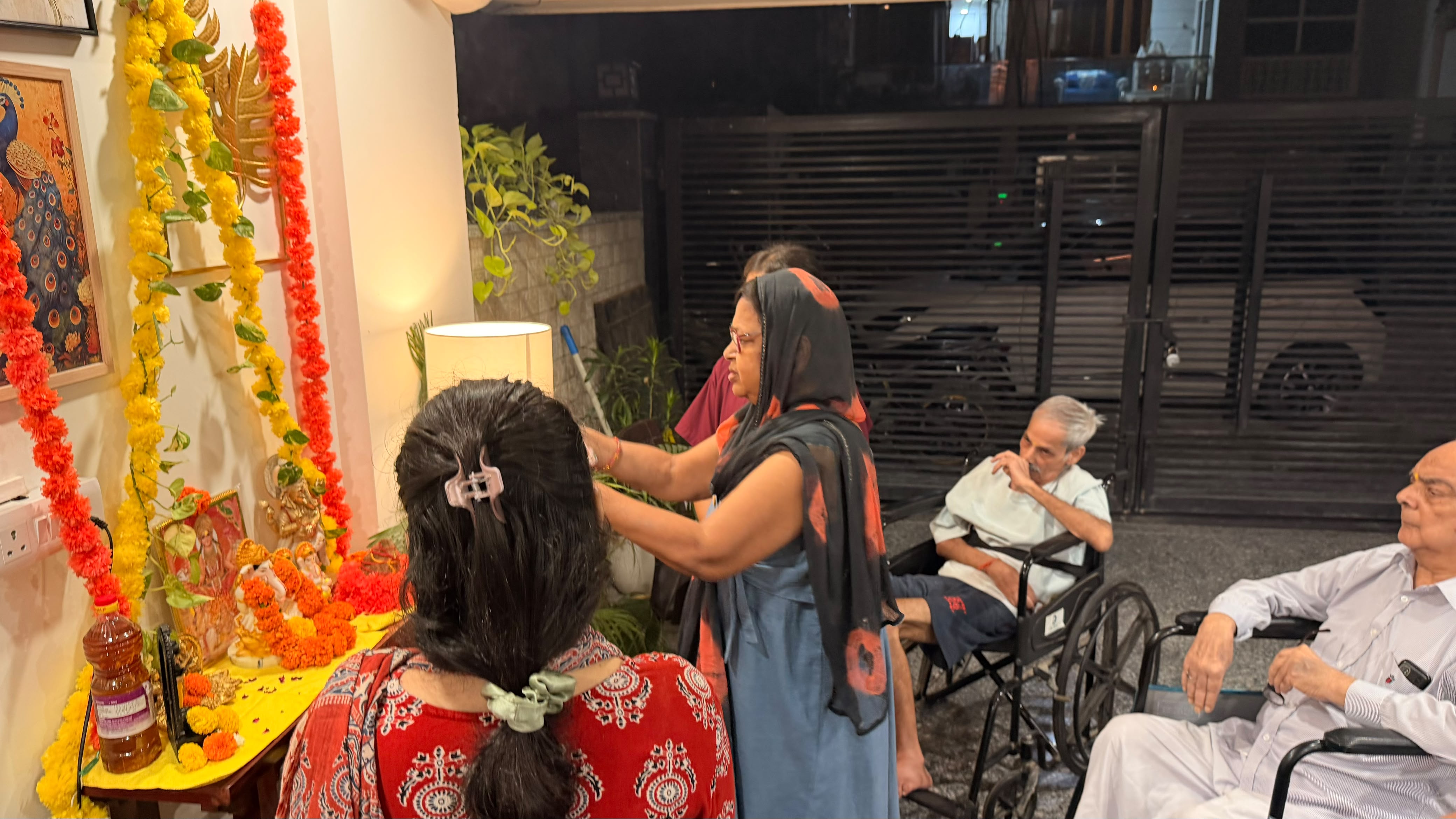 Happy smiling residents celebrating Ganesh Chaturthi festival at Omsorg