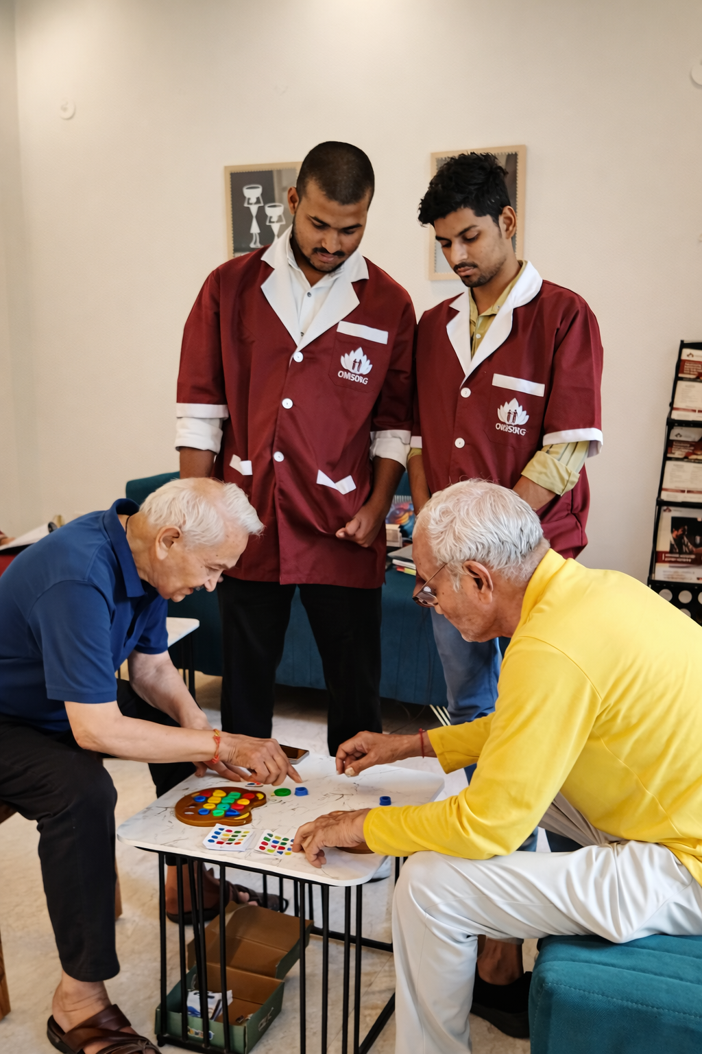 Residents engaged in group cognitive activities and table games