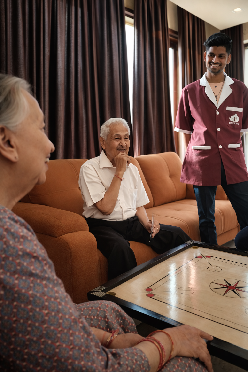 Nurse checking senior vitals and providing health monitoring
